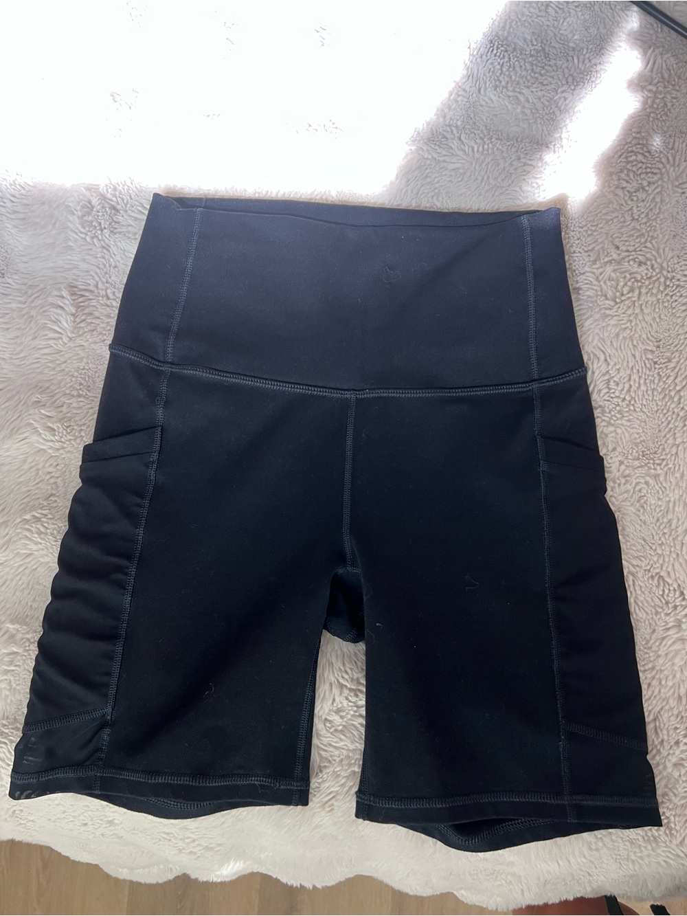 Fabletics Black High-Rise Bike Shorts with Side Pockets